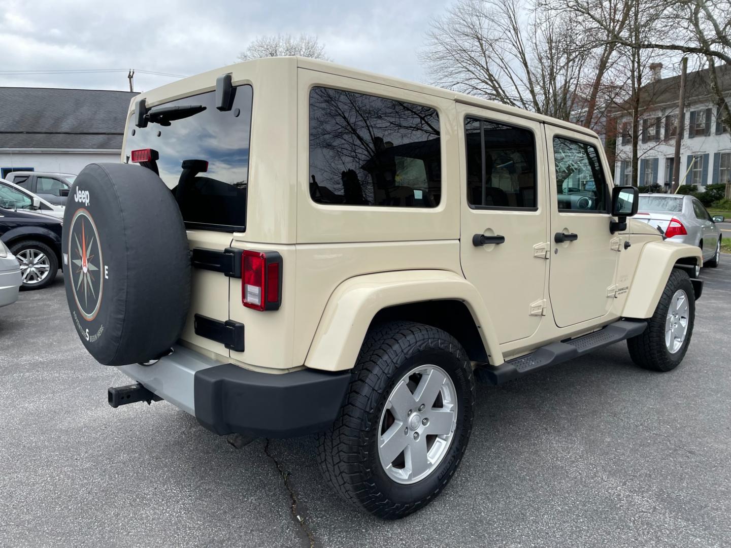 2011 Jeep Wrangler Unlimited Sahara 4WD (1J4BA5H11BL) with an 3.8L V6 OHV 12V engine, located at 101 N. Main Street, Muncy, PA, 17756, (570) 546-5462, 41.207691, -76.785942 - Photo#2
